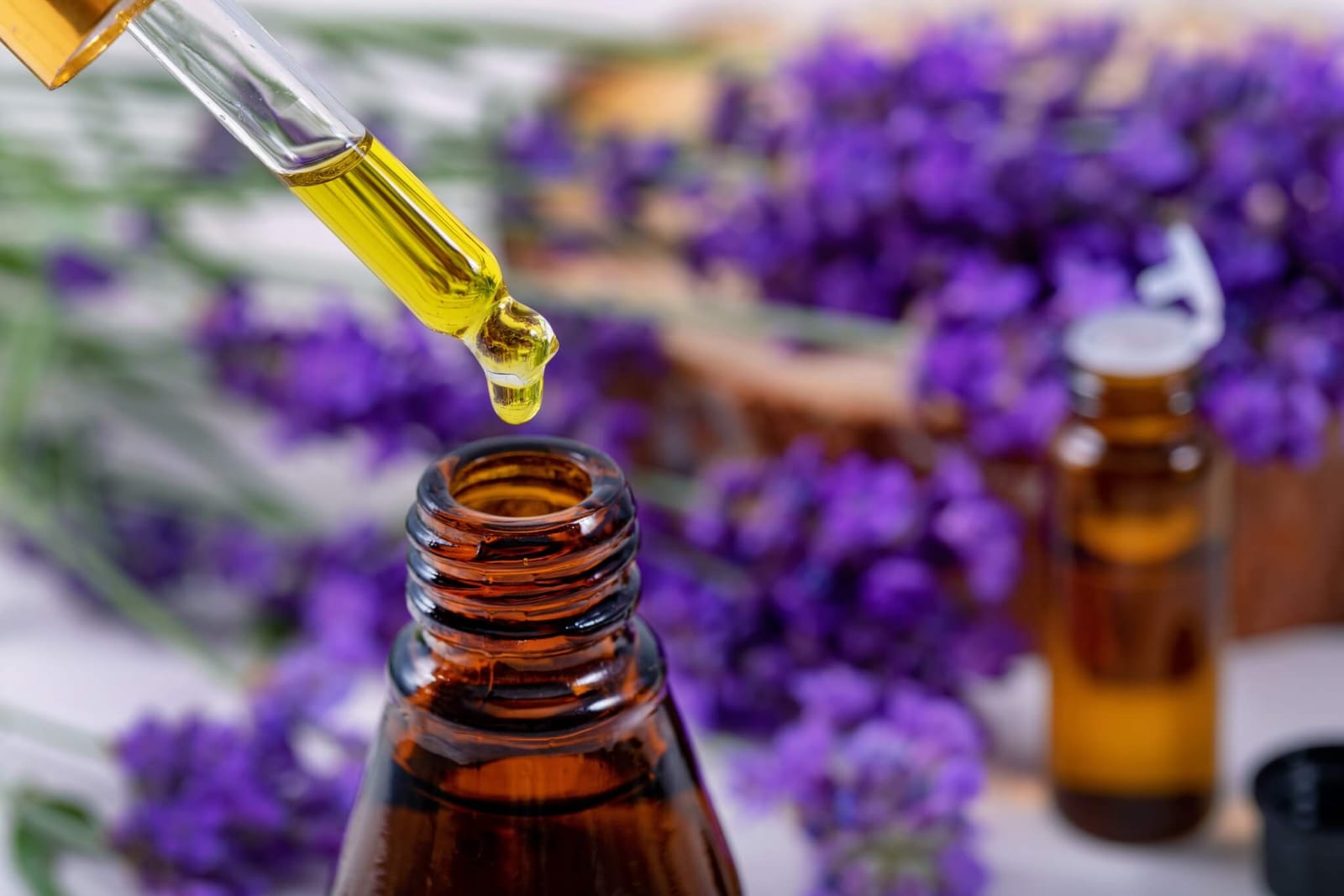 dropper filled with lavender essential oil for congestion and stuffy nose relief