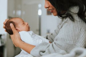 Mother holding her newborn baby