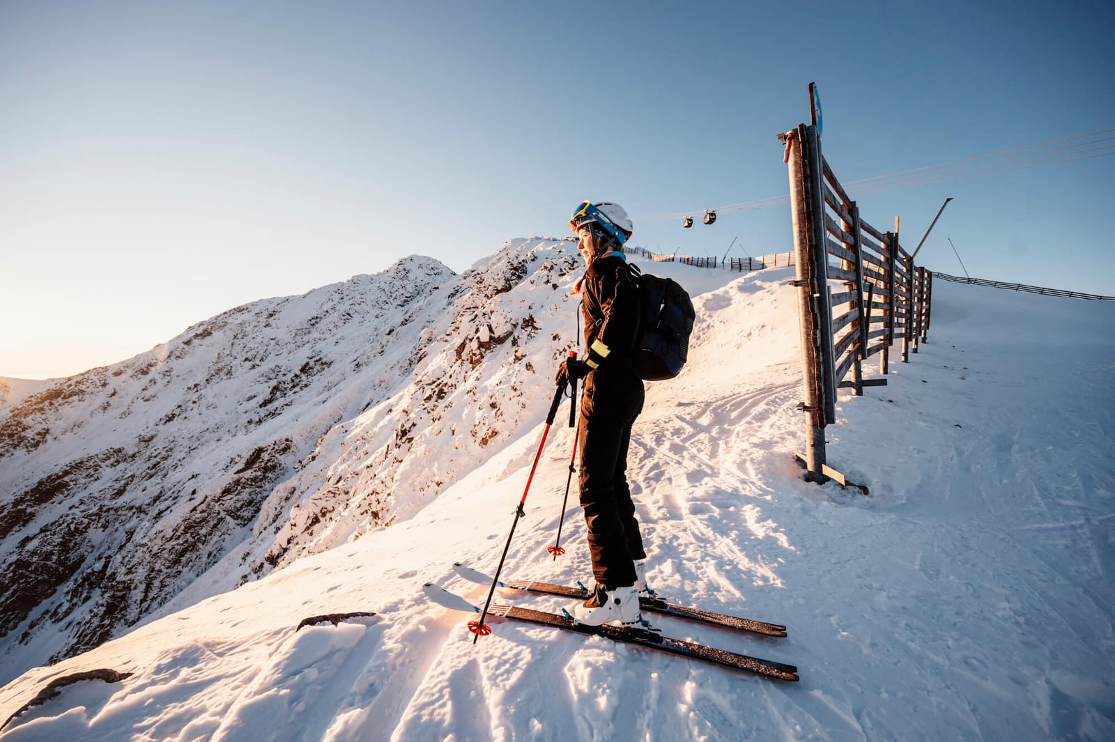 Mountaineer backcountry ski walking in the mountains.